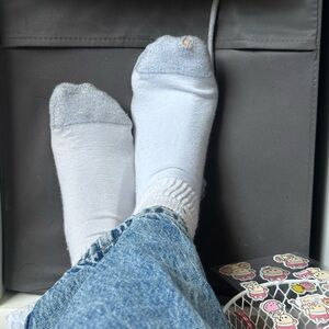 well worn socks in gray